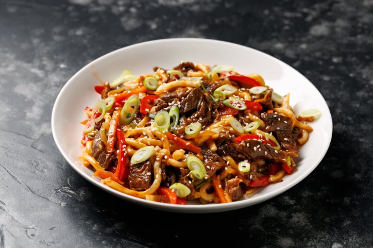 Stir fry udon noodles with beef and vegetable