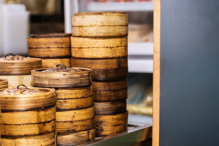 Bamboo steamers stacked high with traditional cooking methods